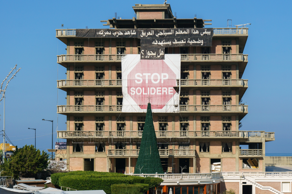 St Georges hotel, with a large sign reading 'Stop Solidere' hanging on the front of the building