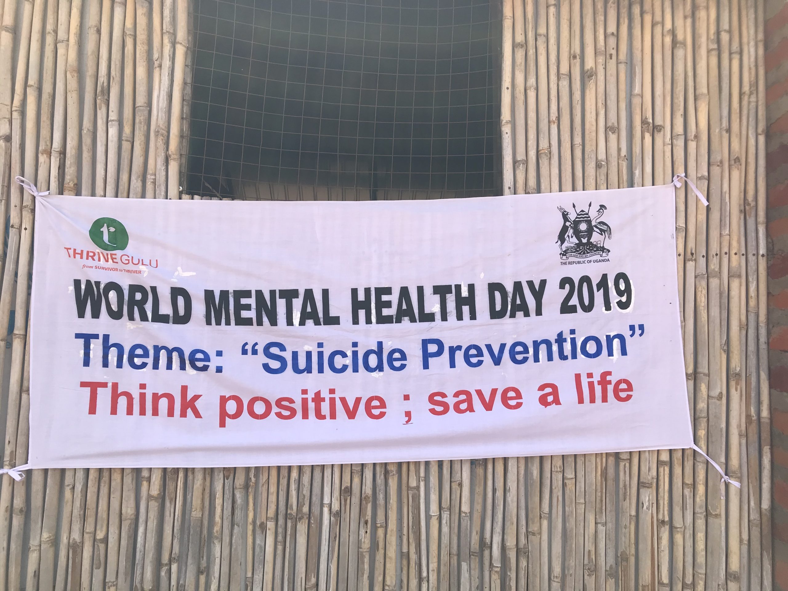A white banner reads: 'WORLD MENTAL HEALTH DAY 2019; Theme: "Suicide Prevention"; Think positive: save a lfe'