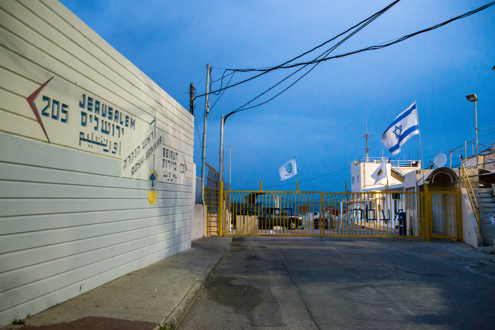 The border between Israel and Lebanon, with the Israel flag in the background